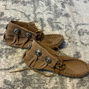 Leather Moccasins. With silver conchos